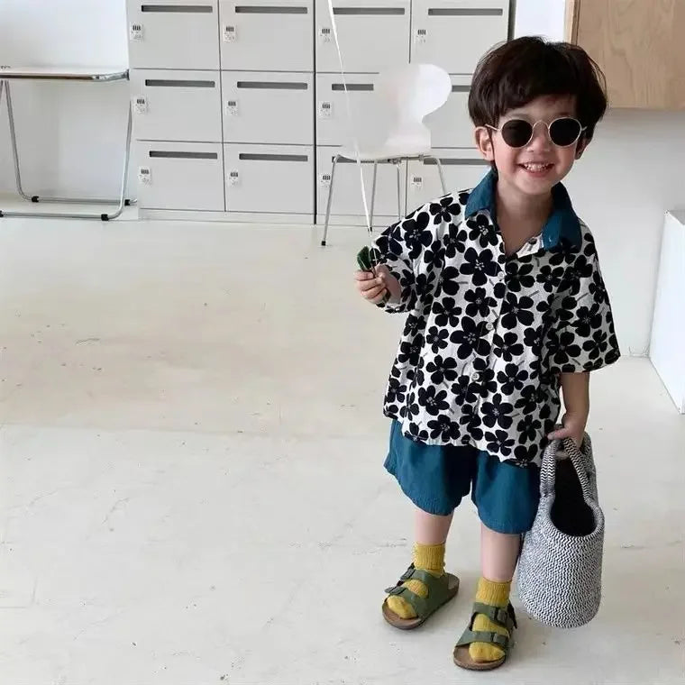 Stylish Flower Suit for Children Baby Short Sleeve Shirt and Casual Shorts Set worn by little boy with sunglasses and sandals