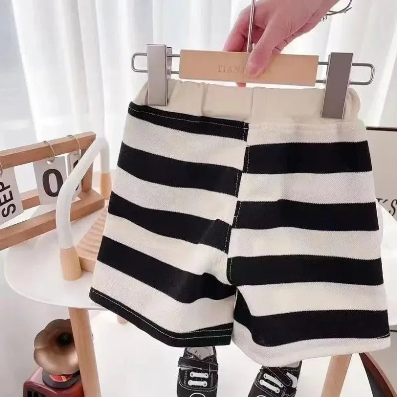 Summer Kids Sets Boys Girls Short Sleeve Striped T-shirt and Shorts Tracksuit black and white striped shorts hanging on wooden hanger