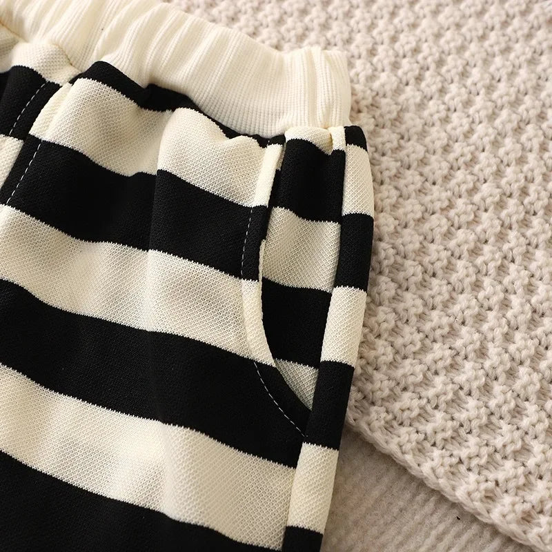 Close-up of black and white striped shorts pocket from Summer Kids Sets Boys Girls Short Sleeve Striped T-shirt and Shorts Tracksuit
