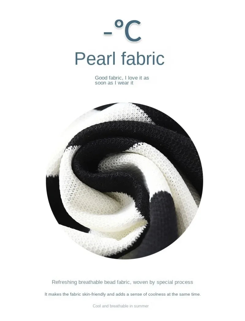 Close-up of black and white pearl fabric showing breathable knit texture for Summer Kids Sets Boys Girls Short Sleeve Striped T-shirt and Shorts Tracksuit