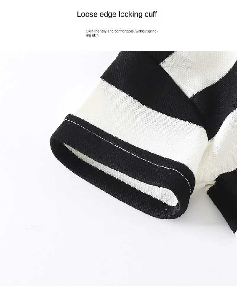 Close-up of black and white striped short sleeve cuff in Summer Kids Sets Boys Girls Short Sleeve Striped T-shirt and Shorts Tracksuit