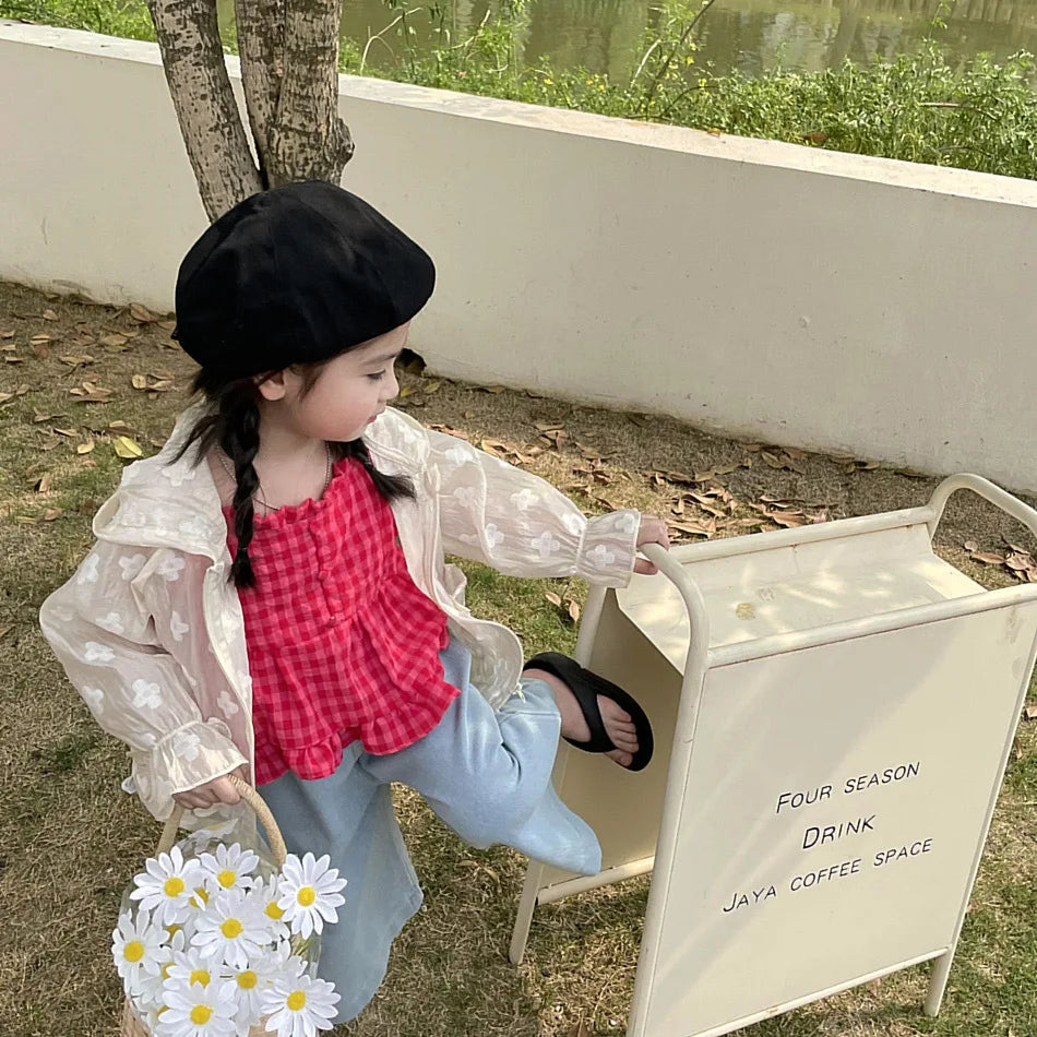 Girl wearing Summer Lightweight Kids Sun Suit Tops Floral Embroidery Girls Hooded Jacket outdoors holding daisy flowers
