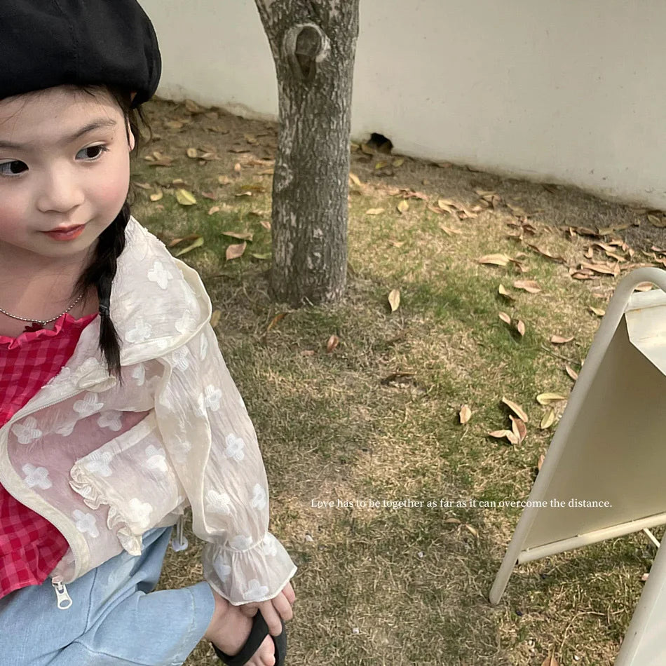 Summer Lightweight Kids Sun Suit Tops Floral Embroidery Girls Hooded Jacket worn by a young girl with a black beret outdoors