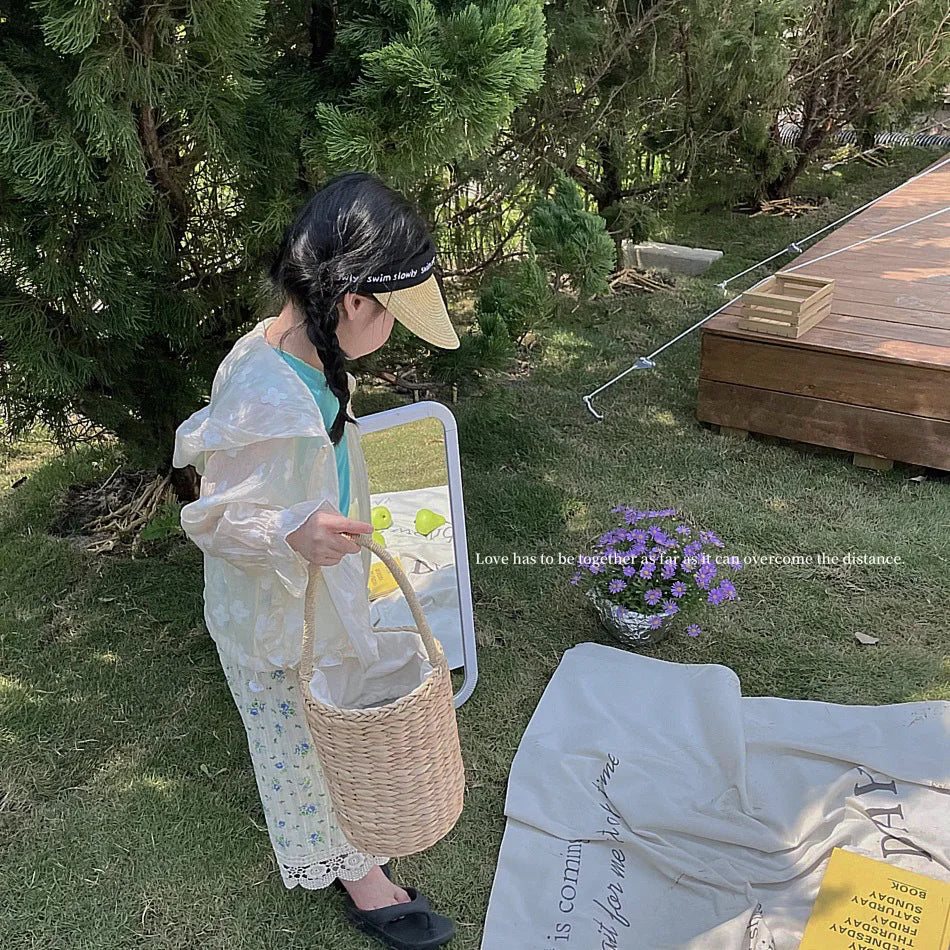 Summer Lightweight Kids Sun Suit Tops Floral Embroidery Girls Hooded Jacket worn by child playing outdoors with basket