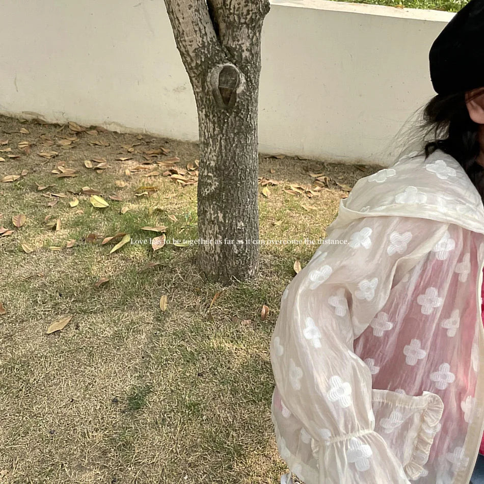 Summer Lightweight Kids Sun Suit Tops Floral Embroidery Girls Hooded Jacket in white worn outdoors