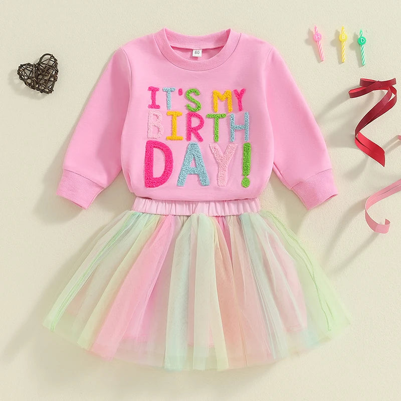 Yamza Tots' Closet pink sweatshirt with colorful Happy Birthday text and pastel rainbow tulle skirt set