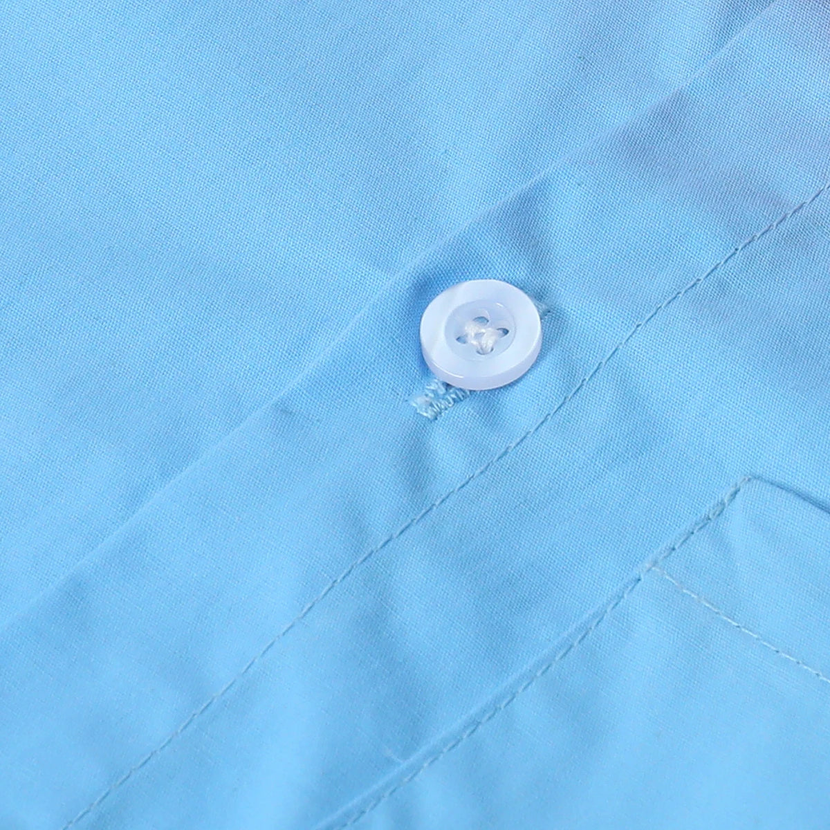 Close-up of blue fabric with white button detailing from Toddler Boy Outfits Baby Halloween collection by Yamza Tots' Closet