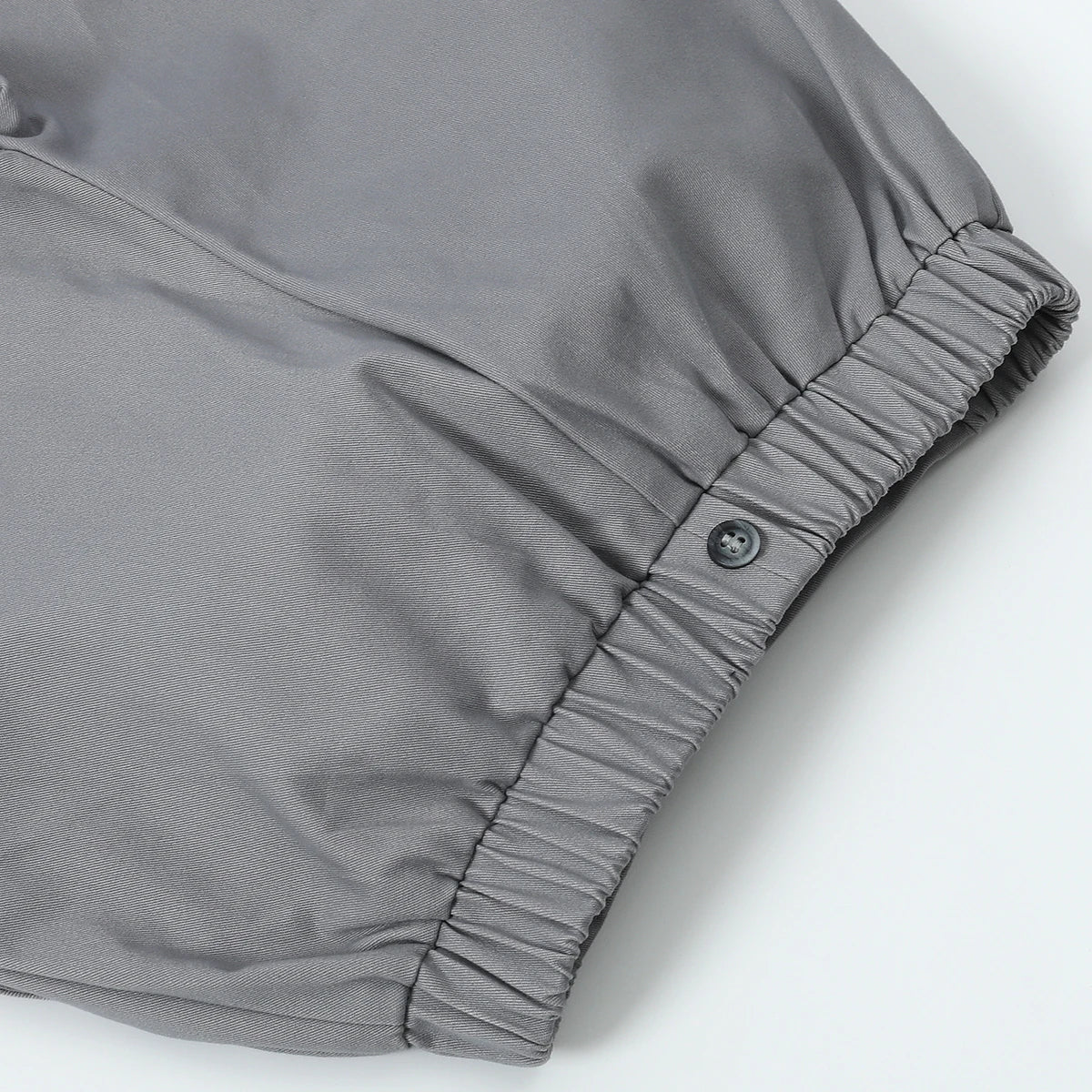 Close-up of gray elastic waistband detail on toddler boy outfits baby Halloween costume by Yamza Tots' Closet