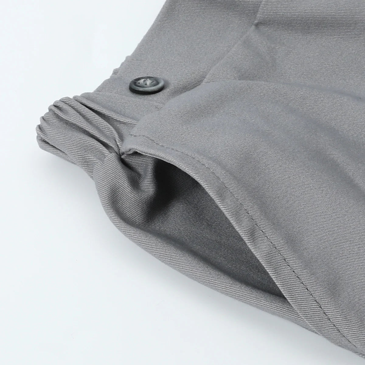 Close-up of gray toddler pants pocket with elastic waistband from toddler boy outfits baby halloween collection