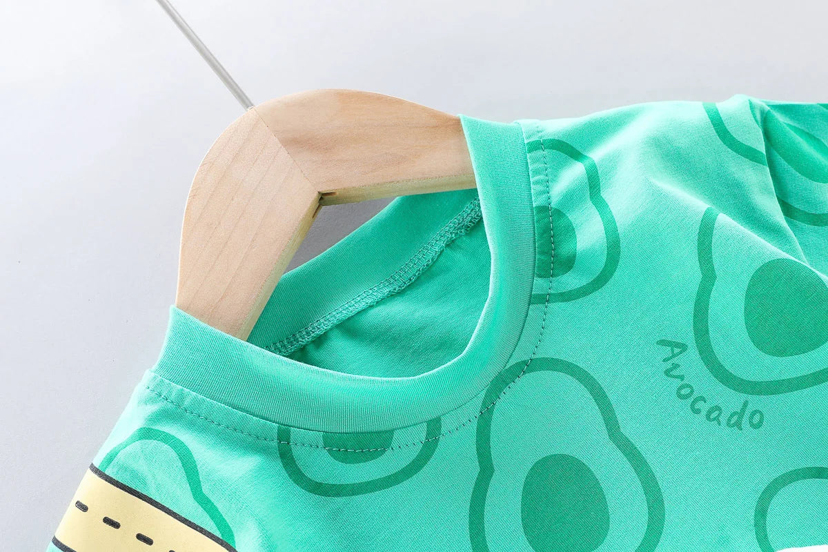 Toddler Boys Fashion Outfit Set Printed T-Shirt with avocado print on a wooden hanger