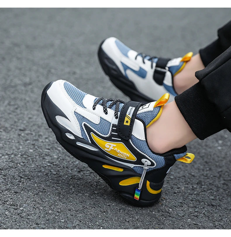 Kids Boys Casual Sneaker Non Slip Sports Shoes Breathable Mesh Comfortable Wear in blue white and yellow on pavement