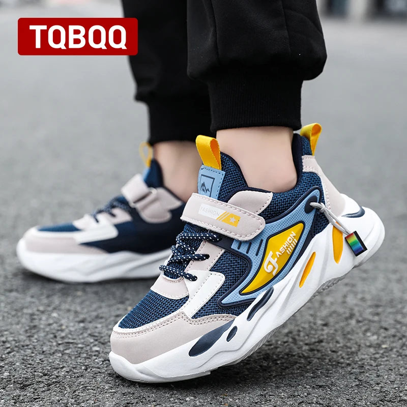 Kids Boys Casual Sneaker Non Slip Sports Shoes Breathable Mesh Comfortable Wear in blue and yellow running on pavement