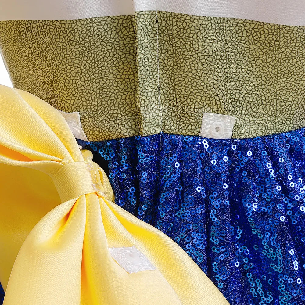 Close-up of Buzz Lightyear Jessie Cosplay Costume featuring blue sequined fabric and yellow bow detail