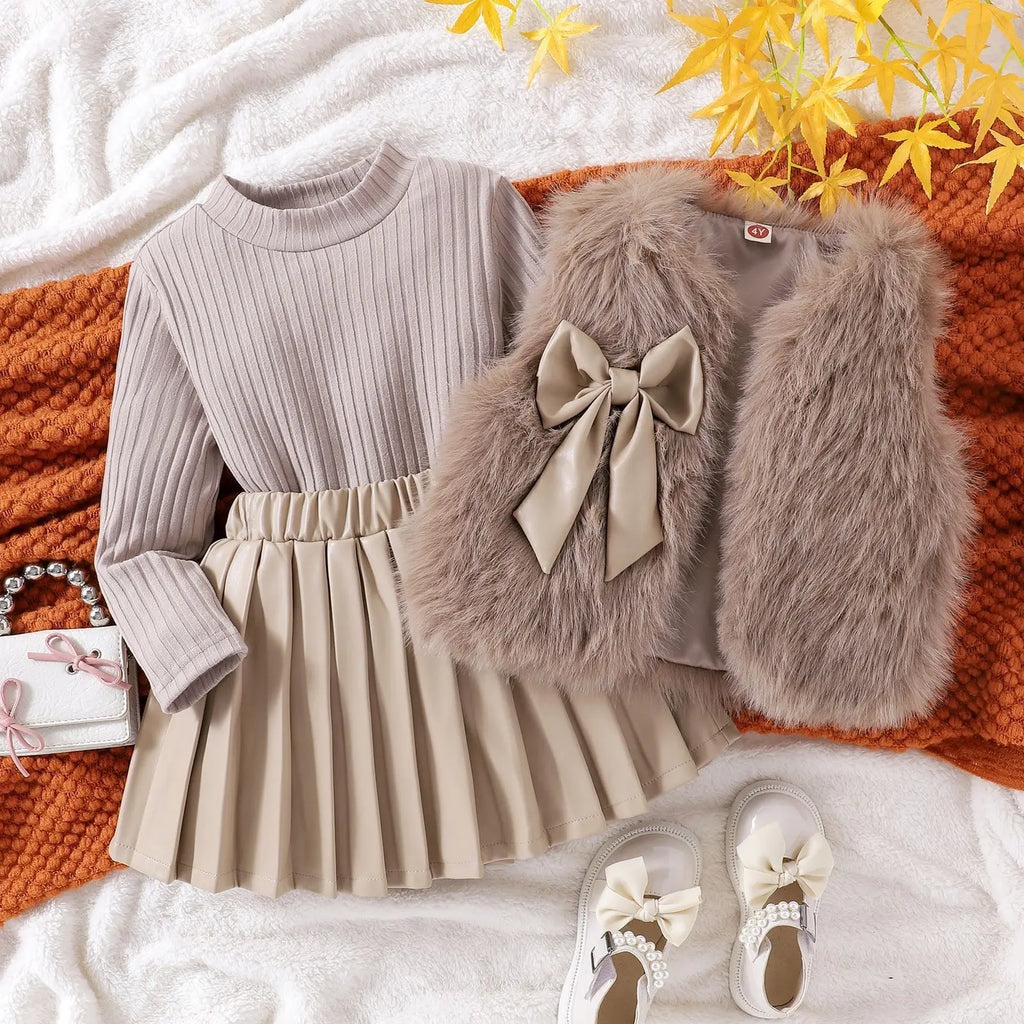Children Clothing Sets Furry Vest Long Sleeve Top Leather Skirt 3pcs Baby Outfit displayed with shoes and a bag