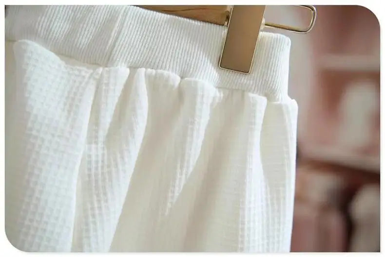 Close-up of white textured pants from Kids Girls Spring Autumn Blouse Top and Pants Set Sweet Casual Outfit Set 