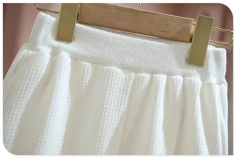 Close-up of white textured pants from Kids Girls Spring Autumn Blouse Top and Pants Set Sweet Casual Outfit Set