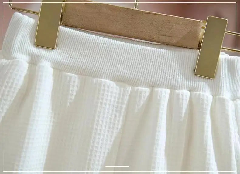 Close-up of white textured waistband on Kids Girls Spring Autumn Blouse Top and Pants Set Sweet Casual Outfit Set