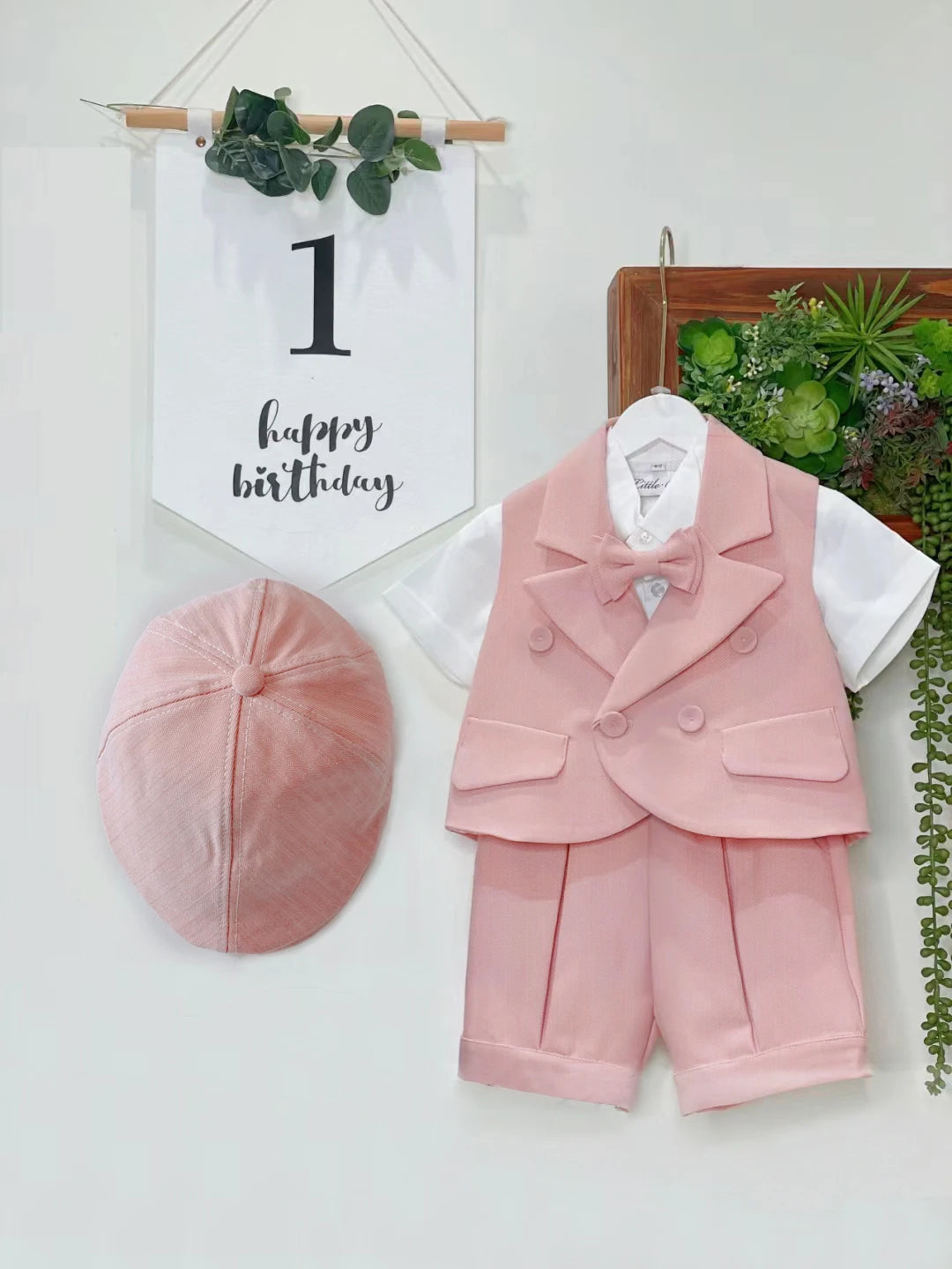 Kids Pink Boys 3-Piece Vest Suit with Tie Bow and Hat Birthday Dress Set displayed with number one birthday banner