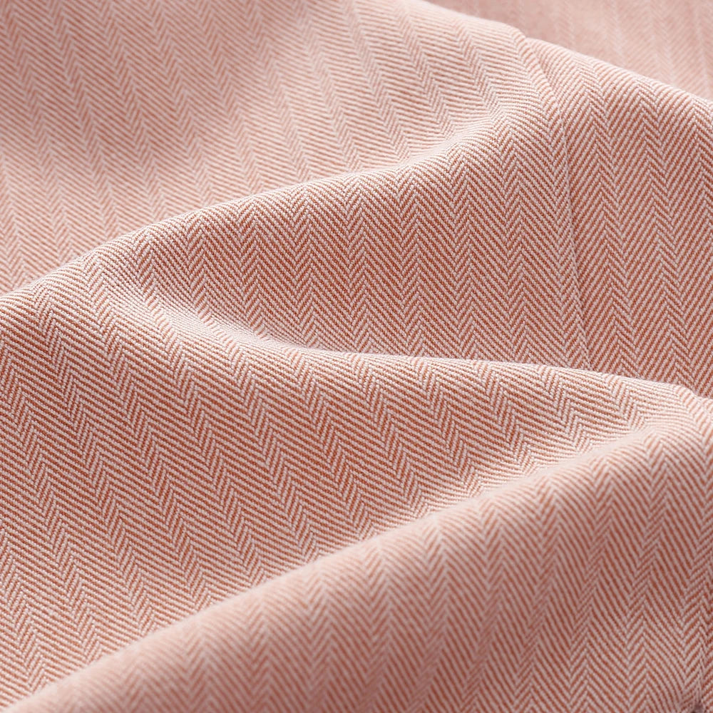 Close-up of pink herringbone fabric used in Kids Pink Boys 3-Piece Vest Suit with Tie Bow & Hat Birthday Dress Set