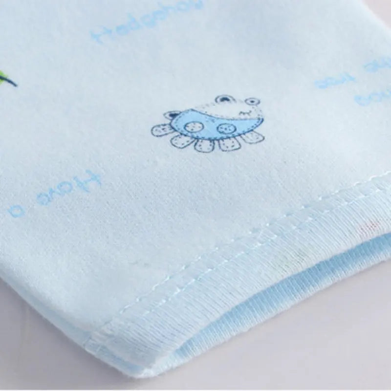 Close-up of Newborn Baby Pure Cotton Clothing Set with Top Pants Hat Bibs Cartoon Print fabric and stitching details