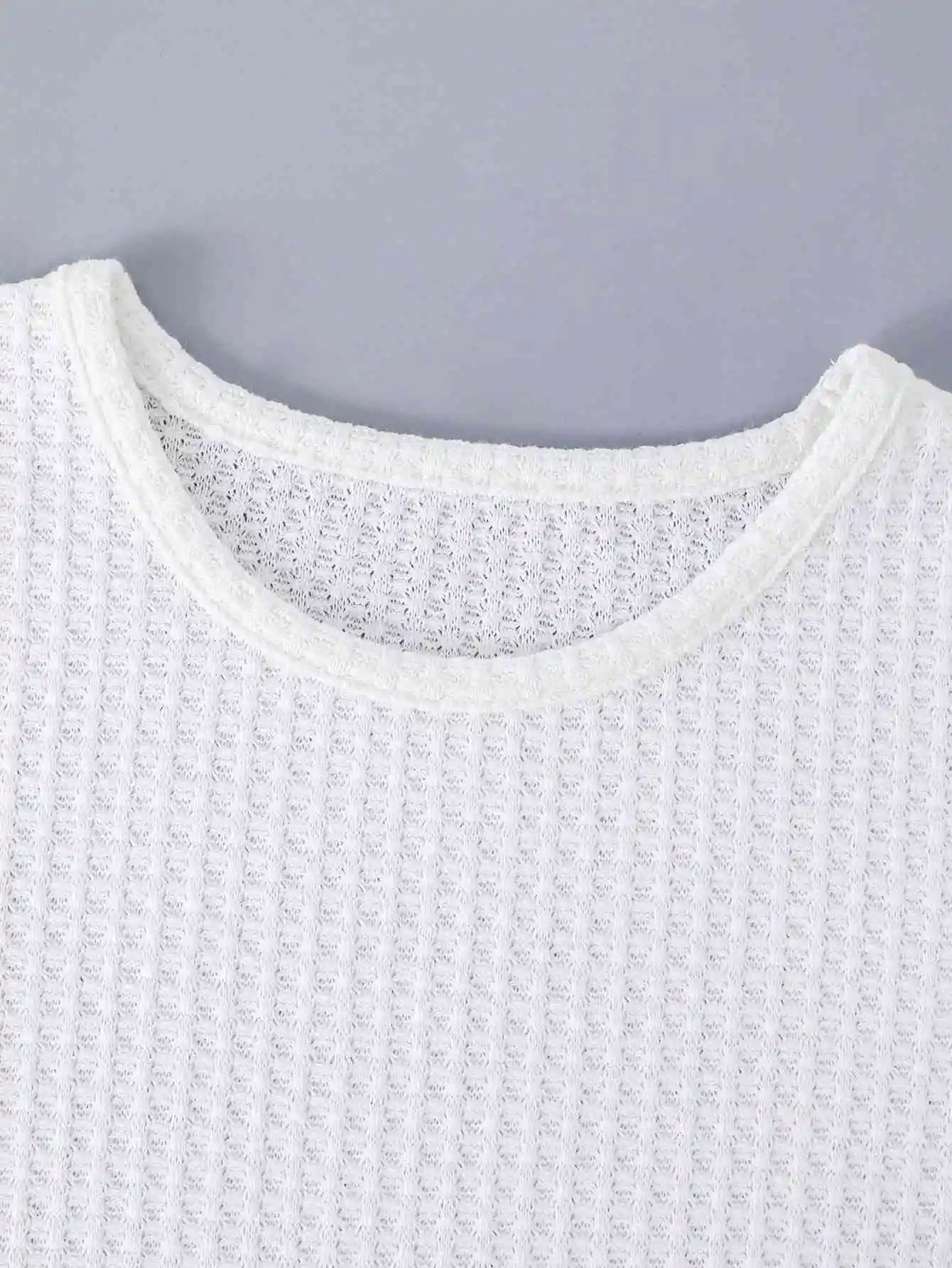 Stylish Boys Outfit Set Trendy Short Sleeve Shirt and Shorts Summer Design white textured knit shirt close-up