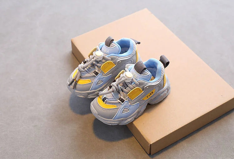 Breathable Mesh Kids Casual Sneakers Non-Slip Sport Shoes for Boys and Girls in gray and yellow on a cardboard box