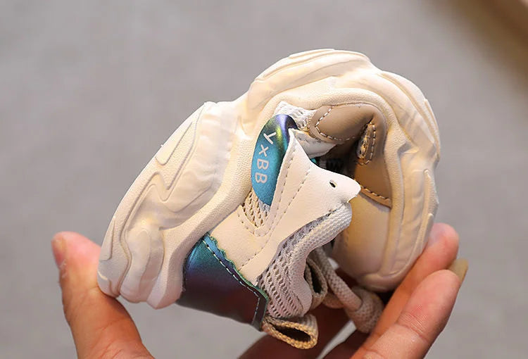 Breathable Mesh Kids Casual Sneakers Non-Slip Sport Shoes for Boys and Girls folded to show flexibility and comfort