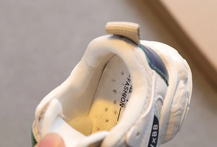 Breathable Mesh Kids Casual Sneakers Non-Slip Sport Shoes for Boys and Girls in white with cushioned interior
